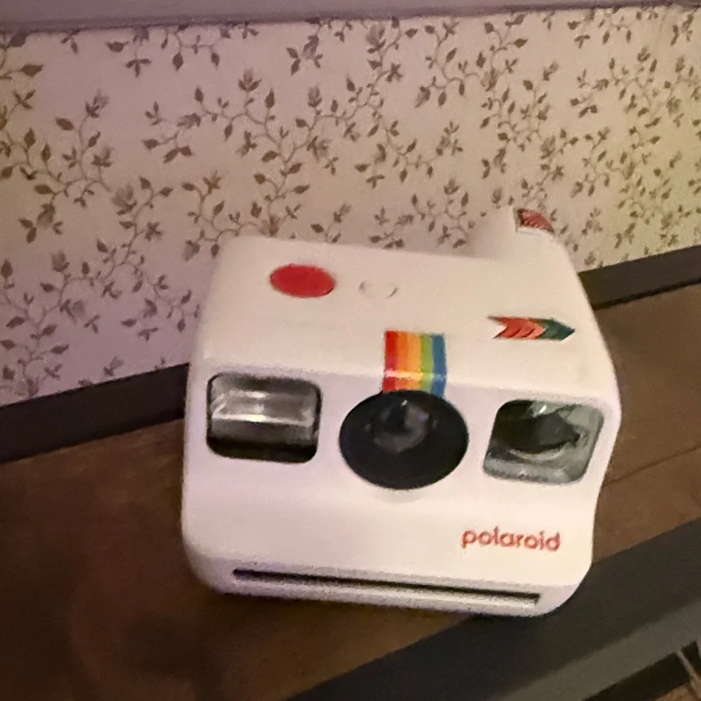 Polaroid White Camera with Rainbow Accent